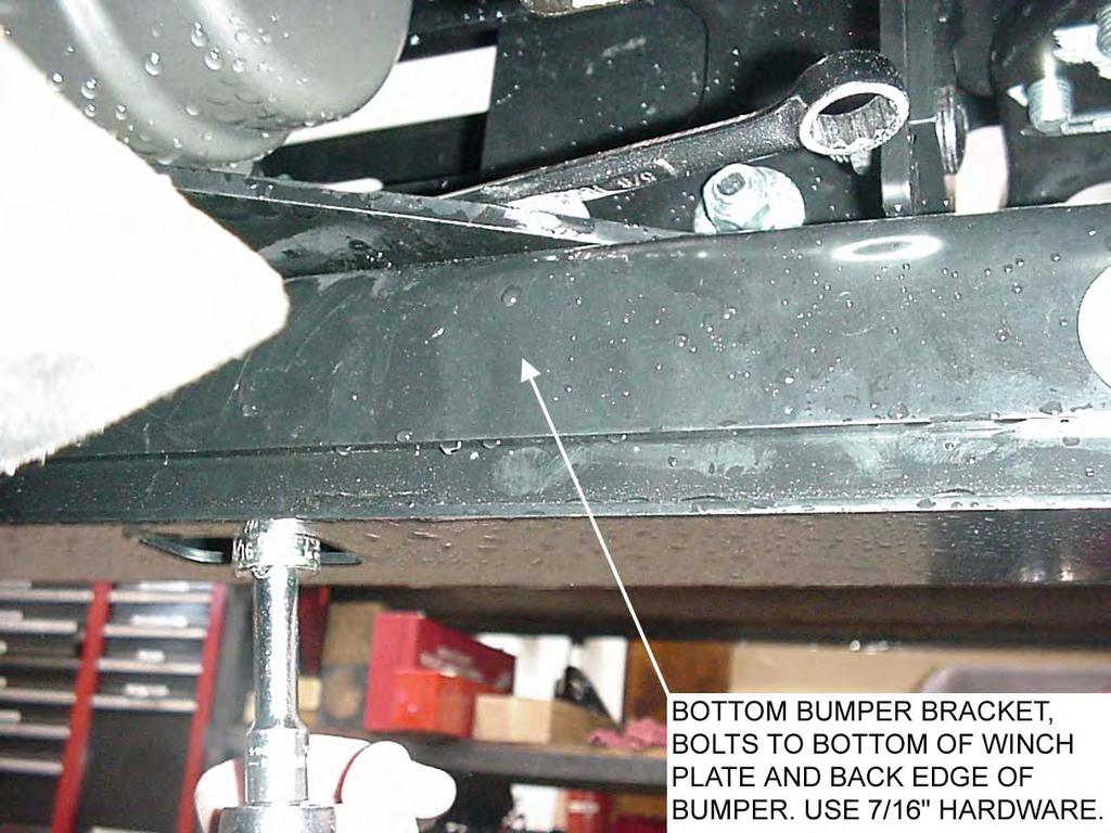Figure 7. Bottom bumper bracket. 14.Attach the fairlead and front license plate mounting bracket (if your state requires a front plate).