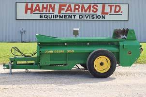 6 EVERYTHING SELLS TO THE HIGHEST BIDDER AS NEW JD 350 single axle manure spreader Ford 7700, 5030/ ldr & 5610 II NH 644 round baler JD 2550 4wd, ldr &