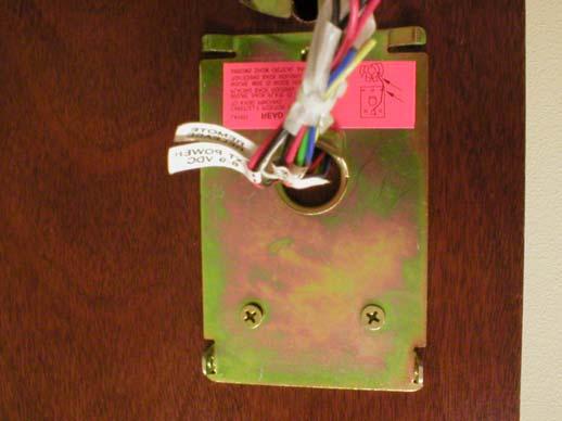 Plug the solenoid cord back into the harness Insert lock