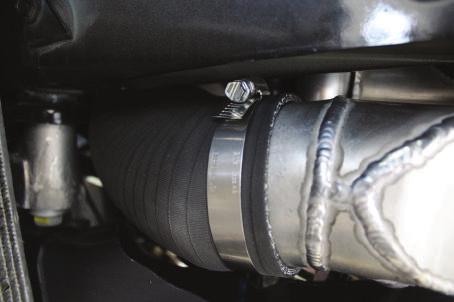 brake cooling duct to the transmission cooler mount.