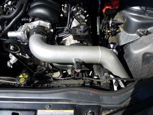 Install 4 to 3 ½ transition hose onto the throttle body, install maf pipe from