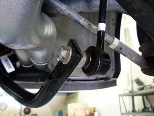Reinstall sway bar using spacers provided.