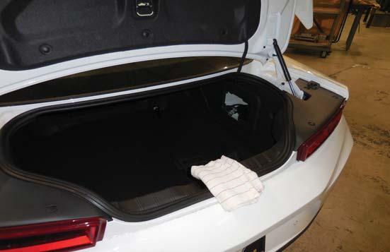 Place a rag over the latch area so the trunk does not accidently get locked.