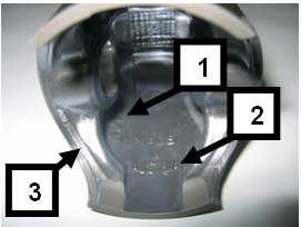 of flashing at the cut out of the piston skirt. All other surfaces are not machined and have cast surface. Any mechanical treatment or rework of the piston is forbidden, (e.g. removal of carbon deposits).