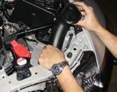 Remove the lower section of the air intake box along \with the flat