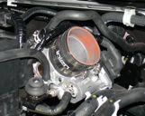 Remove the stock upper coolant outlet hose pressed over