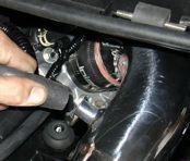 line over the intake port as shown  The harness clip