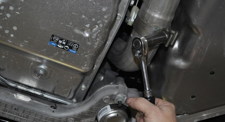Unbolt and separate the steering shaft from the rack. WARNING: DO NOT rotate the shaft while it is disconnected. It may cause issues with turn signals, horn, and alignment. 18.
