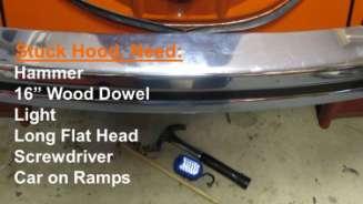 With a hammer, wood dowel, light, long flat head screwdriver and the car on ramps you can gain