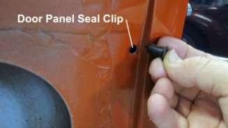 1548. Install the door panel female rubber seal clips by pushing