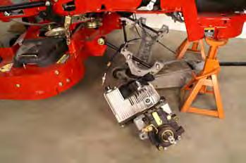 34. Lower the UHT/cradle assembly from the frame by lowering the floor jack.