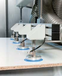 The workpiece is placed onto the running surface feeder manually or by
