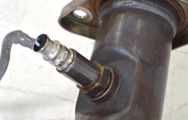 4. Installing the CorkSport Midpipes a) Remove the oxygen sensor from the OEM midpipe using a