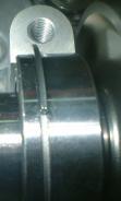 Tighten the new nut to the specified torque. Torque: 100N-m (10kgf-m, 73lb-ft) Stake the nut with a punch.