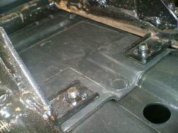 Remove 2 bolts from front protector,and