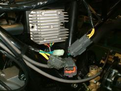 Inspection on regulator rectifier Remove the seat, rear carrier and rear fender. Disconnect two 3 pin couplers of the regulator rectifier.