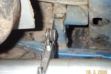 9) The rear swinger hanger mounts with an existing bolt in a 1 square tube that connects this tube to a bumper mount directly above the right tail pipe.