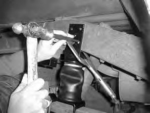 A welding clamp or C-clamp may assist in holding the upper bracket to the frame. Figure 12 NOTE: It is necessary to use at least three of the five pre-drilled holes in the upper bracket for mounting.