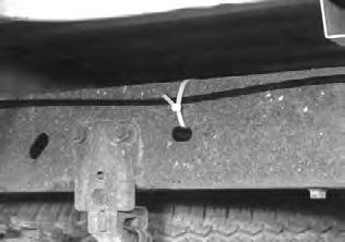 Where there are no holes to secure the straps to, use the air line clip (HH) and self tapper (II) to secure the air line to the frame (Figure 22).