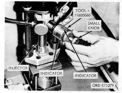 Orifice hole burnishing tool installation Figure 3-70. Orifice plug burnishing c. Lubricate O-Rings with GAA lubricant. d. Start injectors into bores with inlet toward camshaft.