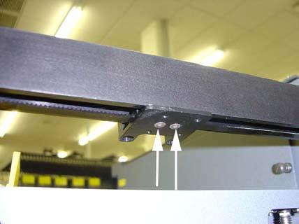 Locate the Y belt clamps on the underside of both the Y rails. 6. Remove the screws shown above to free the Y belt. 7.