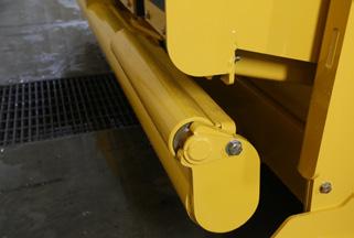 truck configurations. The integrated scrapers and easy-to-remove rollers simplify maintenance. DUMP ASSIST.