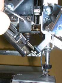 Adjustment of needle position (back and forth) 3-3-4 1. Bring needle bar down.
