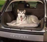 Helps keep your pet from entering the rear seat and passenger area. 20 13 14 15 16 17 18 19 21 22 23 14. VEHICLE COVER.