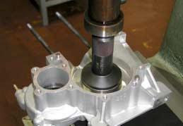 - INSERT CRANKSHAFT BEARINGS; BALLS TO BE ON UPPER SIDE VISIBLE DURING THE
