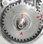 YES NO 1 2 2- INSTALL GEAR ON BALANCE SHAFT SO THAT THE C LETTER CAN BE READ ON THE SURFACE AND