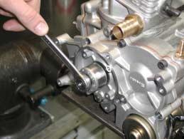 PREVENT THE CRANKSHAFT FROM TURNING (see Fig.5).