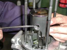 ( 13mm HEXAGON RING WRENCH) - REMOVE WASHERS 12. REMOVE CYLINDER (see Fig.26). Fig.26 - REMOVE CYLINDER BASE GASKET 13.