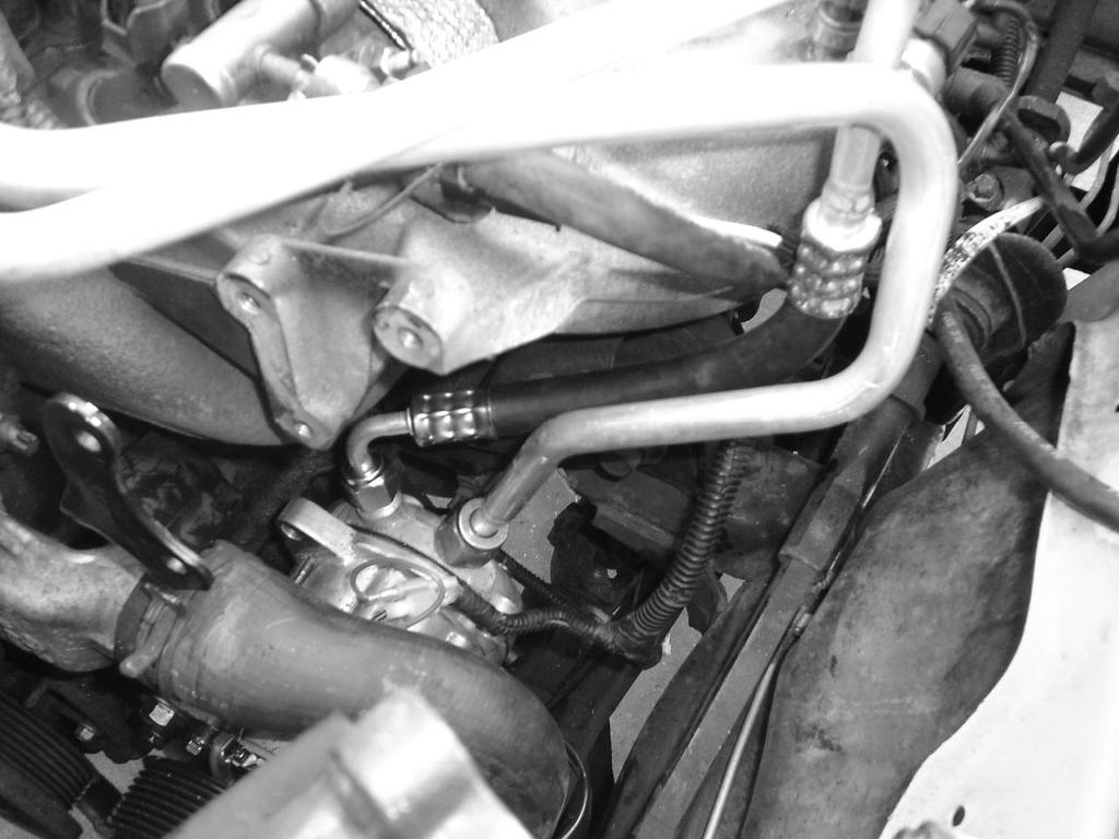 3. After the compressor is mounted, do not install the belt or power-steering pump. You will have to connect the hoses and wire the compressor first. 4.