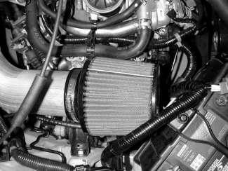 Use the supplied 1 hose clamp on the AEM intake pipe nipple and the original hose clamp on the valve cover nipple. g.