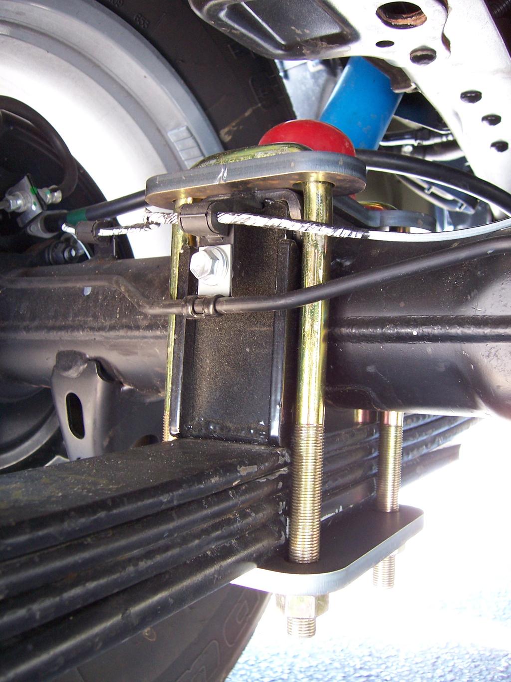 Page 6 Installation of Front lowering kit Step 10: Install the SOS axle components as shown in photo below.
