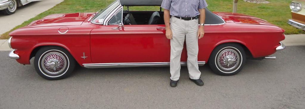 Cliff Eckdahl of Redwing, MN in their white 1965 convertible and Craig