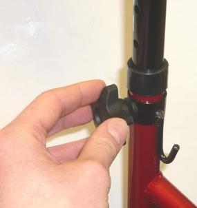 screw A from the tightening handle through the hook B bracket and the hole.