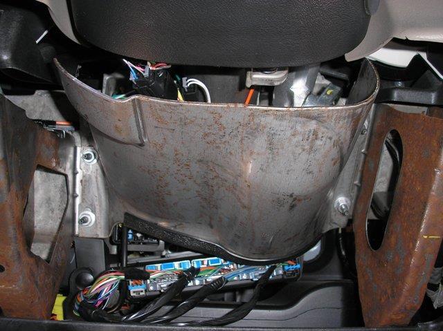 With the Under Dash Panel removed, you will need to remove this Metal Knee bolster, it is held in place by (4) 10mm Bolts.