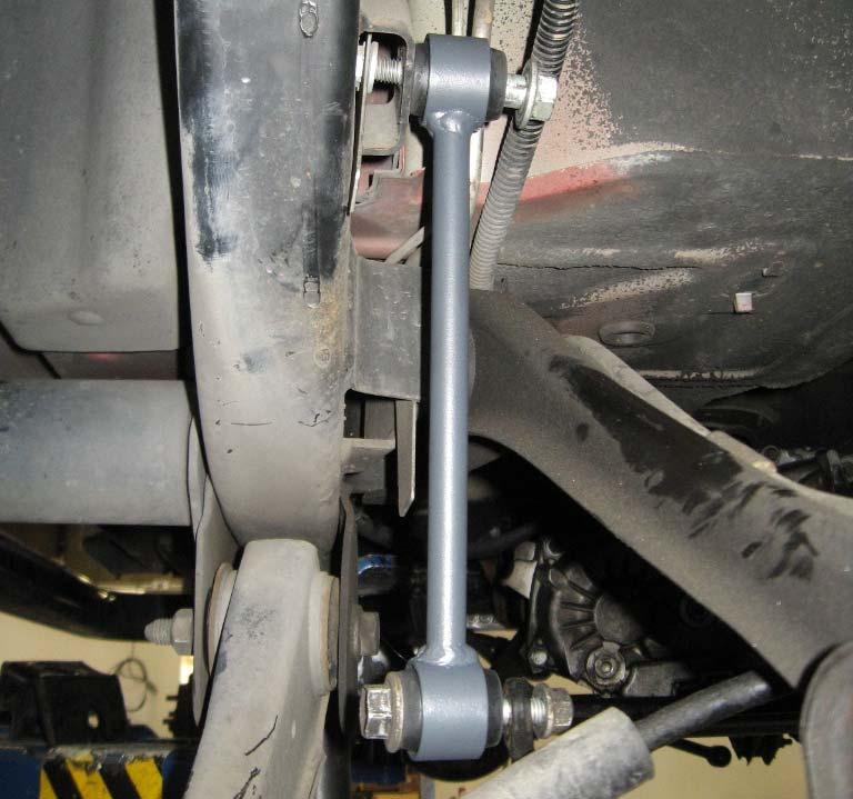 Frame Mount OE Bolt OE Bolts 82-TM30016 Sway Bar End Link TM73235002 Rear Shock OE Bolt 14. Reinstall the brake line drops to the frame using the previously removed OE hardware. 15.