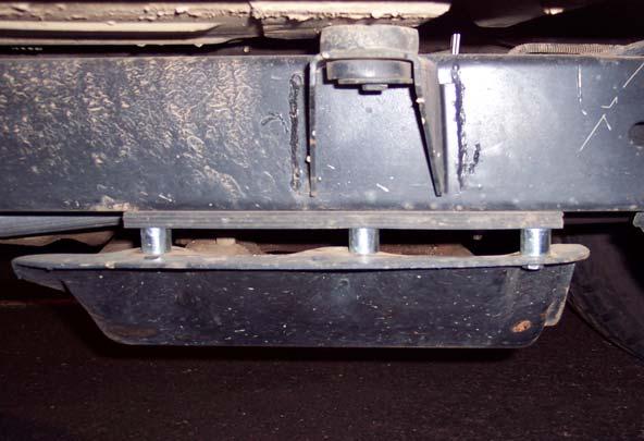 If contact is made, the skid plate cannot be reinstalled. 16. Install the rear shock (TM73235002) to the vehicle using the previously removed OE hardware.