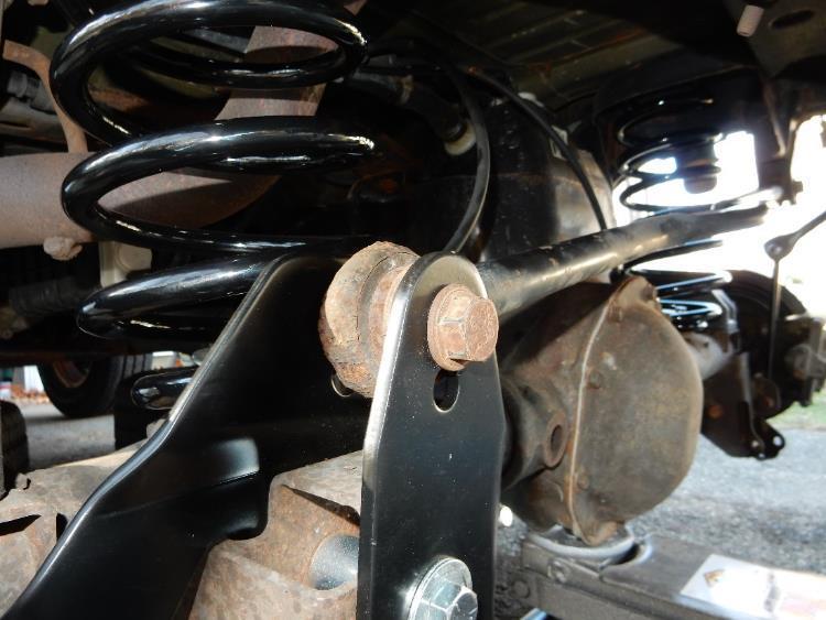 Note: Do not torque control arm bolt until vehicle is on the ground and at ride height. 31.