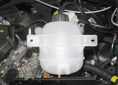 Final Work Produce oblong hole [x] Enlarging holes 79 Fasten expansion tank. Ensure sufficient distance to heater! expansion tank 80 WARNING! Reassemble the disassembled components in reverse order.