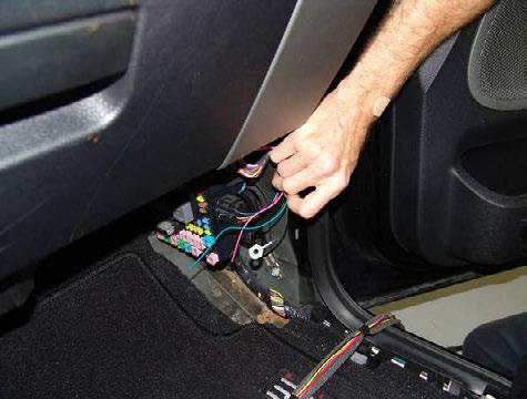 (Figure 33). 46. Route the supplied interior harness green, red, and black wires along the vehicle cross dash harness. Secure using wire ties wherever possible at 2 inch intervals. 47.