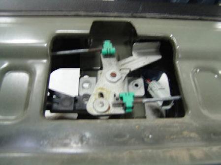 Install lock cylinder into supplied tailgate camera handle with by pushing