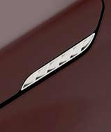 00 47 Tail lamp trim set 990E0-65J05-XXX Set of 2-pieces, supplied painted to body