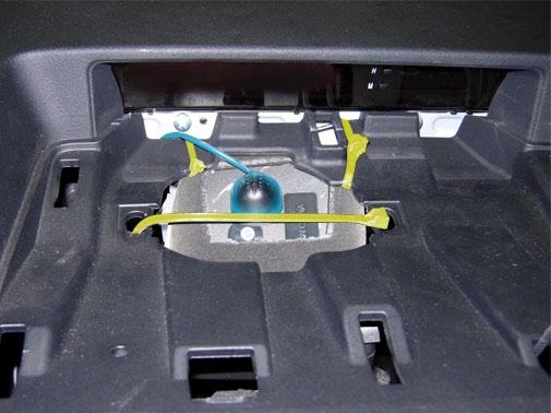 center of the module. Cut off excess ties (Fig. 1-10). NOTE: This is the location of the center speaker (speaker will not be present).