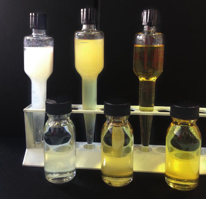 STABILITY TEST Three different types of additives underwent a stability test: A typical Fatty Acid A typical Ester-type Additive PC 32 In the picture below, samples in the foreground are the