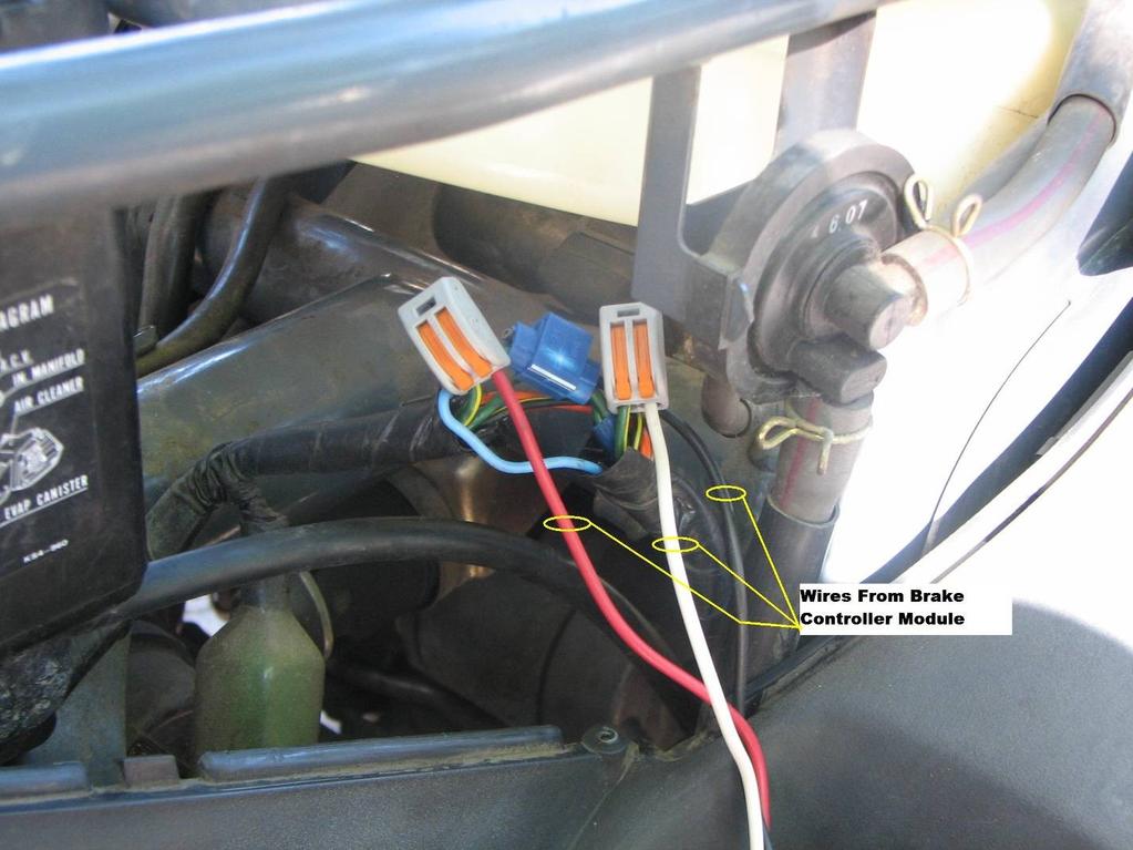 6. Use the included Lever-Nut to connect the RED wire from the control module to the Green/Yellow brake signal wire coming from the brake switch. Lift up orange lever and insert stripped end of wire.