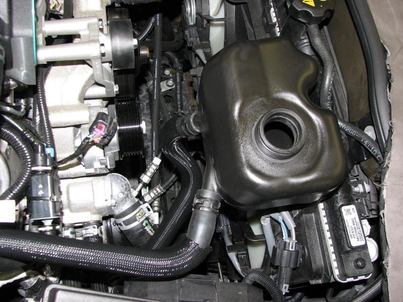 11. Fill the intercooler system reservoir 3/4 full with a 50/50 mix of Dexcool/ Deionized
