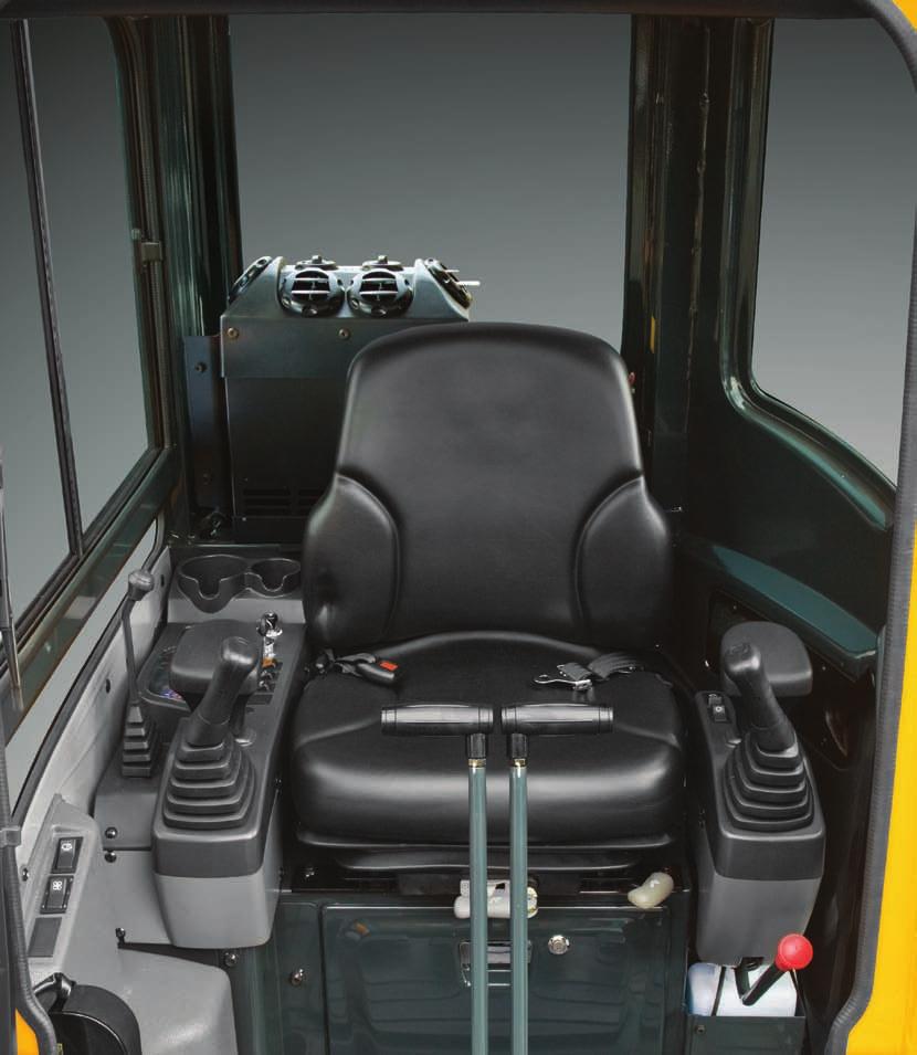 Two cup holders are integrated into the right console for large and small drink storage. 3. An additional storage box with key lock is accessible under the operator's seat. 4.